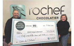 Roch Fournier and Carole of the Rochef chocolatier team celebrating the success of their fundraiser to provide meals and snacks to students facing food insecurity in Gatineau. Photo: Courtesy